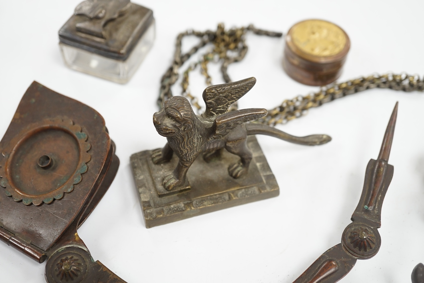 Curios including a miniature percussion pistol, an Art Nouveau pill box and a silver mounted inkwell (7). Condition - poor to fair